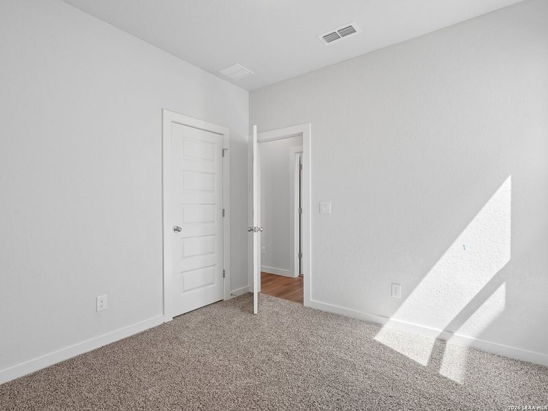 Spacious, unfurnished interior of a new home in Talley Fields, San Antonio (Image 18).