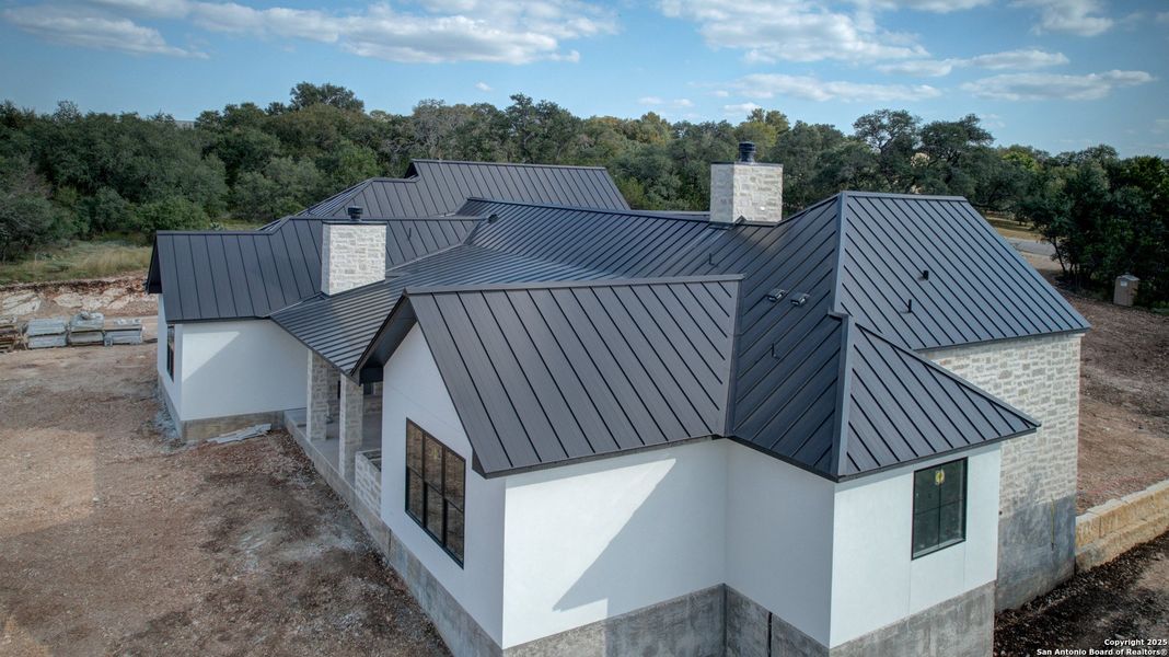 Front exterior of a new home in , New Braunfels, TX, highlighting curb appeal (Image 13). Front exterior of a new home in , New Braunfels, TX, highlighting curb appeal (Image 13).