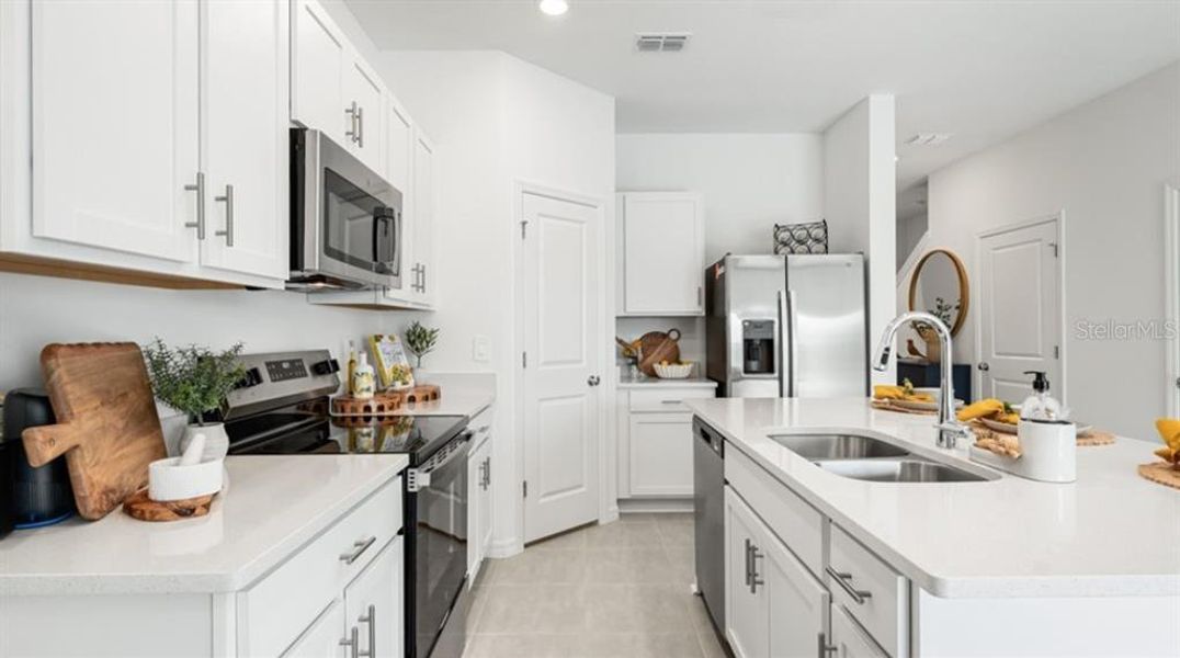 Furnished interior view inside a new home in The Towns at Firethorn, Parrish (Image 12).