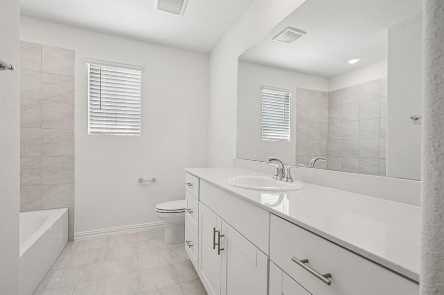 Photo is not of the actual home, but is an inspirational photo of builder’s model home and may depict options, furnishings, and/or decorator features that are not included.