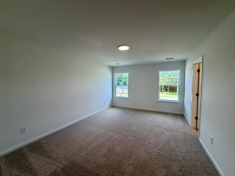 Spacious, unfurnished interior of a new home in Bellevue Townhomes, Greenville (Image 12). Spacious, unfurnished interior of a new home in Bellevue Townhomes, Greenville (Image 12).