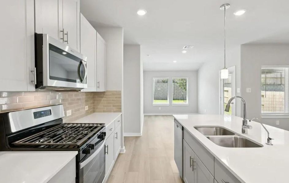 Photo is not of the actual home, but is an inspirational photo of builder’s model home and may depict options, furnishings, and/or decorator features that are not included