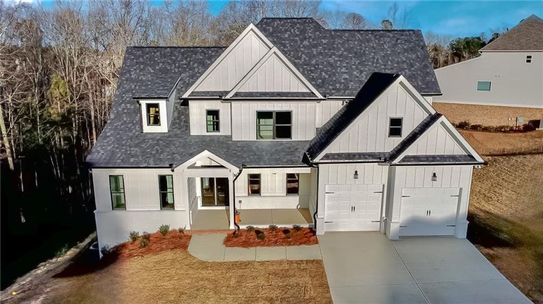 Front exterior of a new home in , Waleska, GA, highlighting curb appeal (Image 15).
