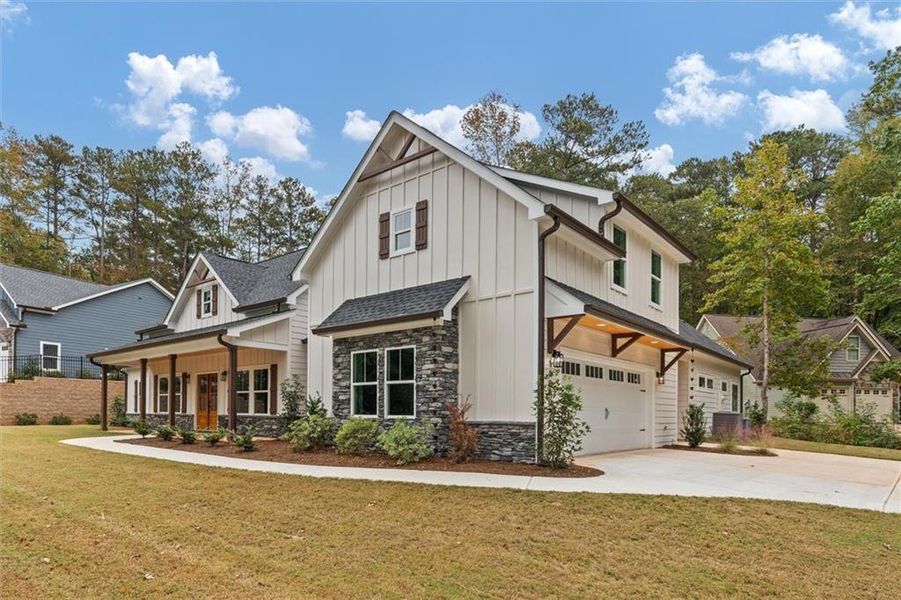 Front exterior of a new home in , Villa Rica, GA, highlighting curb appeal (Image 24).