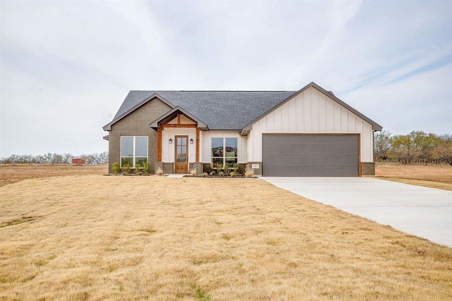 Front exterior of a new home in , Millsap, TX, highlighting curb appeal (Image 21). Front exterior of a new home in , Millsap, TX, highlighting curb appeal (Image 21).