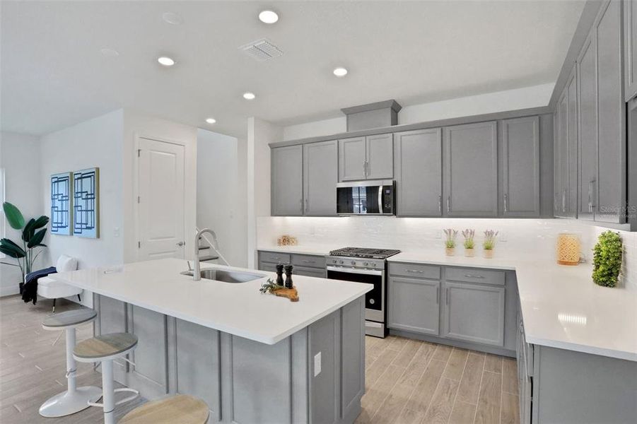 Furnished interior view inside a new home in Bungalow Walk at Lakewood Ranch, Sarasota (Image 9).