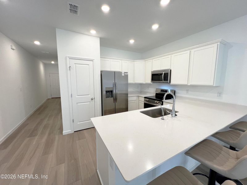 Furnished interior view inside a new home in , Orange Park (Image 4).