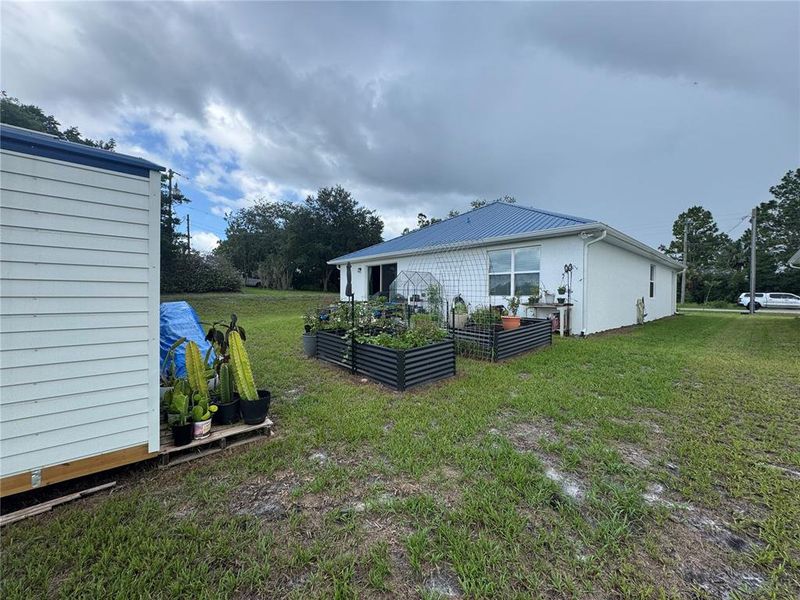 Front exterior of a new home in , Osteen, FL, highlighting curb appeal (Image 22).