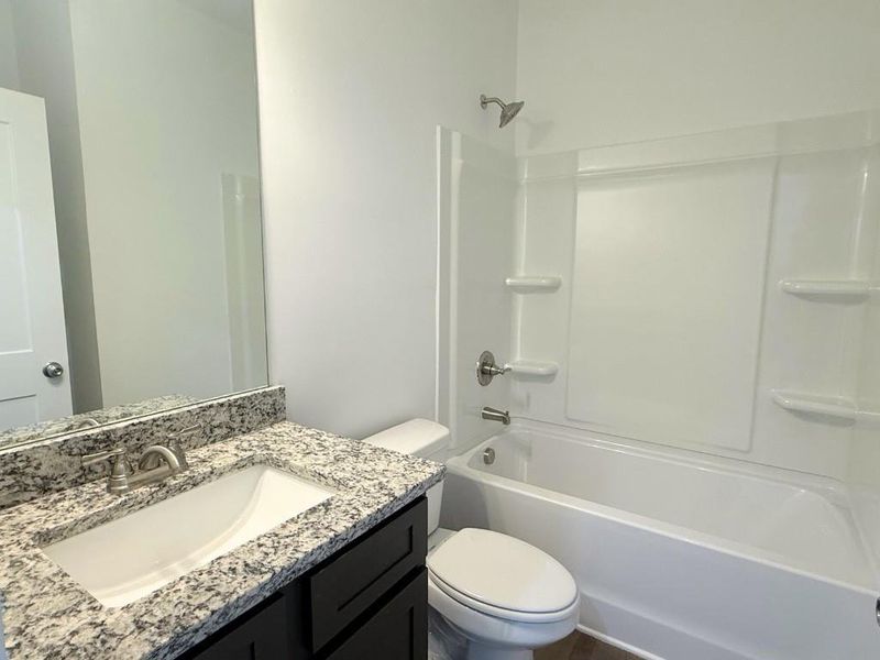 Furnished interior view inside a new home in Westlyn, Winder (Image 6).