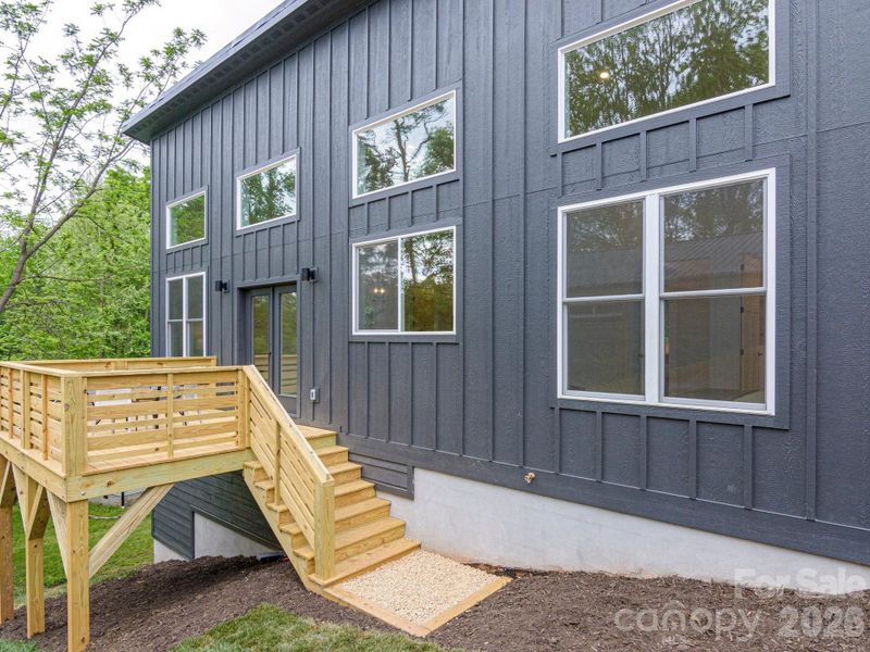 Exterior details and patio area of a home in , Asheville (Image 29).