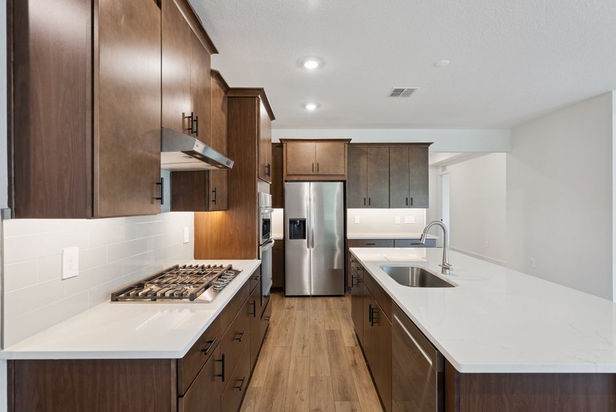 Stainless Steel Appliances & Sleek Countertops