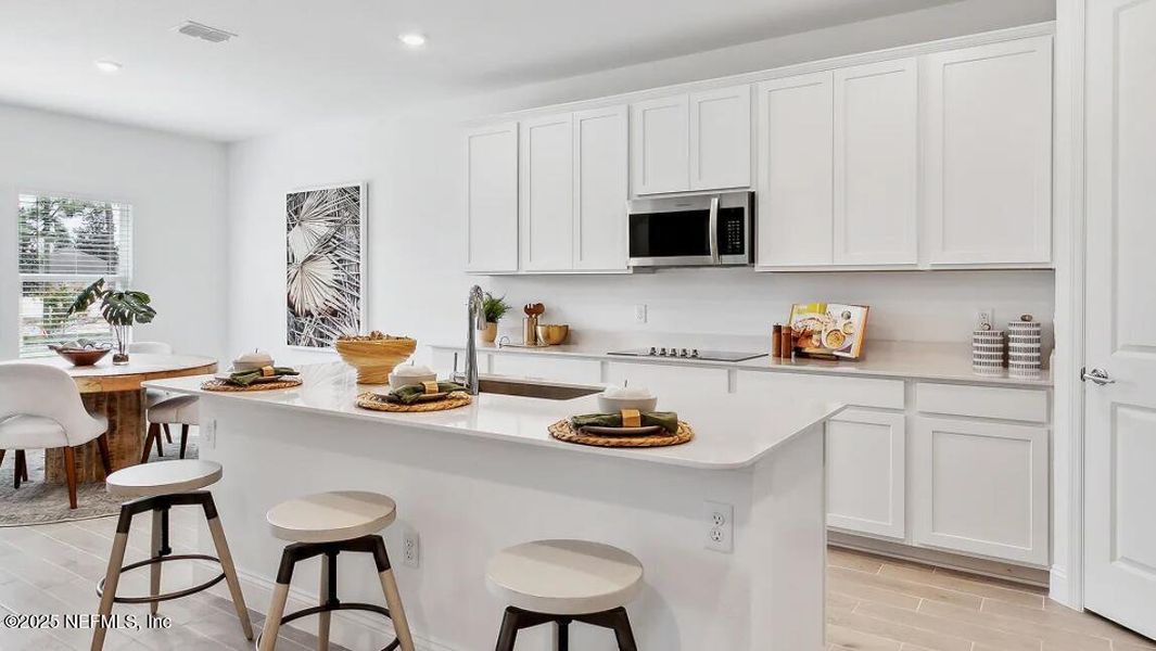 Furnished interior view inside a new home in Edenbrooke at Hyland Trail | 55+: Edenbrooke at Hyland Trail 60s, Green Cove Springs (Image 11).