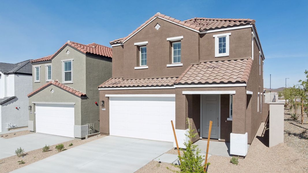Front exterior of a new home in The Buttes at Mystic, Peoria, AZ, highlighting curb appeal (Image 2).