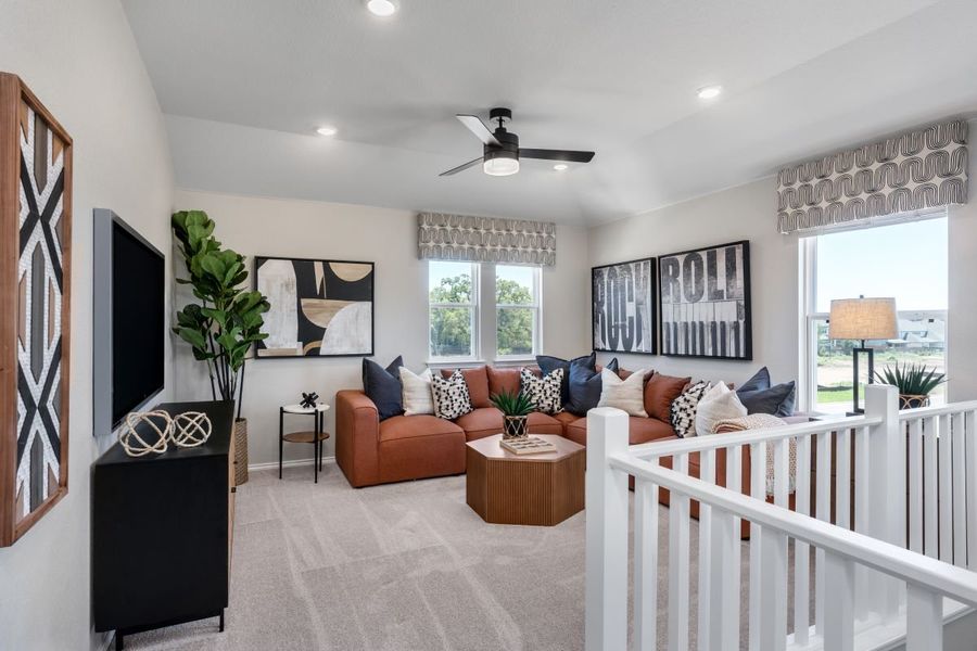 Representative furnished interior of a home built from the 2429 Modeled by KB Home in River Bluff, Leander (Image 6).