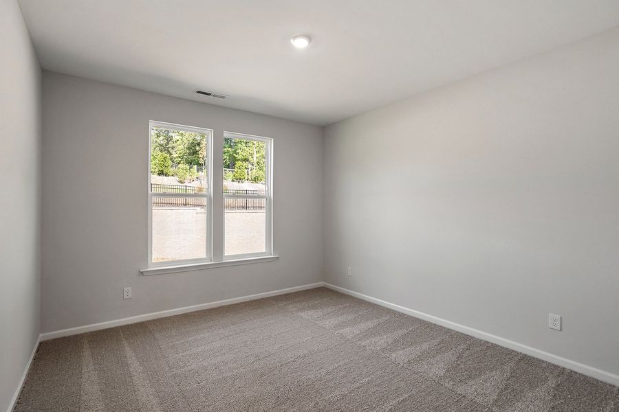 Spacious, unfurnished interior of a new home in Ovation at Sweetbrier, Durham (Image 27).
