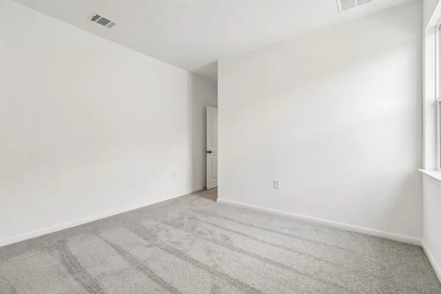 Representative unfurnished interior of a home built from the Duval by Taylor Morrison in Eastwood, Manor (Image 34).
