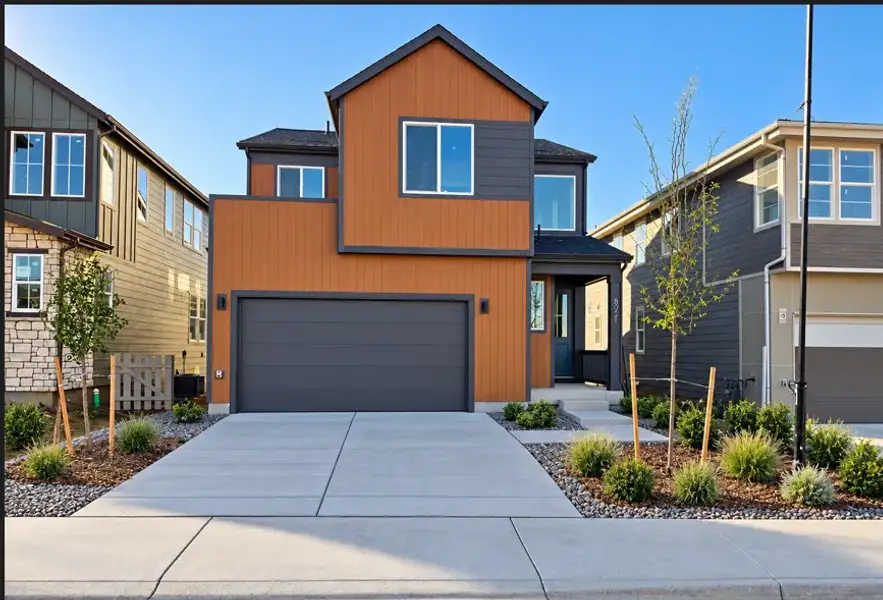 Front exterior of a new home in Trumark Homes at Sterling Ranch, Littleton, CO, highlighting curb appeal (Image 1). Front exterior of a new home in Trumark Homes at Sterling Ranch, Littleton, CO, highlighting curb appeal (Image 1).