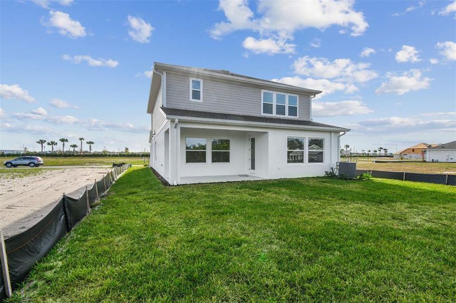 Exterior details and patio area of a home in Waterset Tradition Series, Apollo Beach (Image 25).