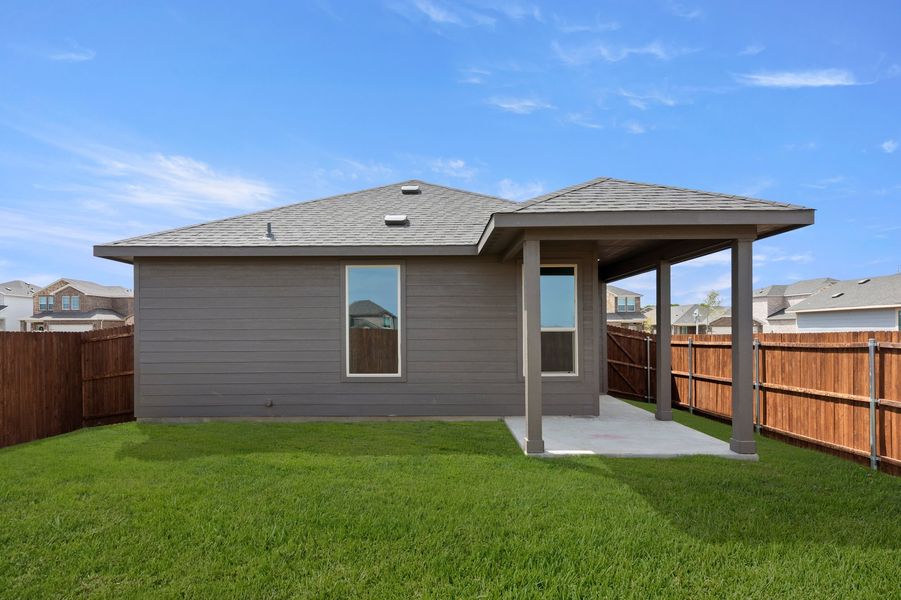 Front exterior of a new home in Creekside Ranch, Blue Ridge, TX, highlighting curb appeal (Image 27).