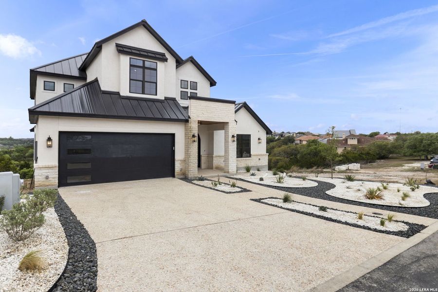 Front exterior of a new home in , Boerne, TX, highlighting curb appeal (Image 34).