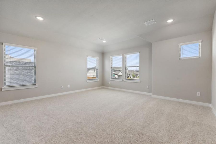Game room in the Masters home plan by Trophy Signature Homes – REPRESENTATIVE PHOTO Game room in the Masters home plan by Trophy Signature Homes – REPRESENTATIVE PHOTO
