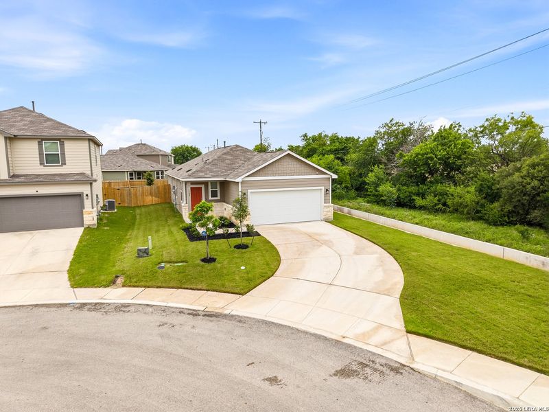 Front exterior of a new home in , San Antonio, TX, highlighting curb appeal (Image 25).