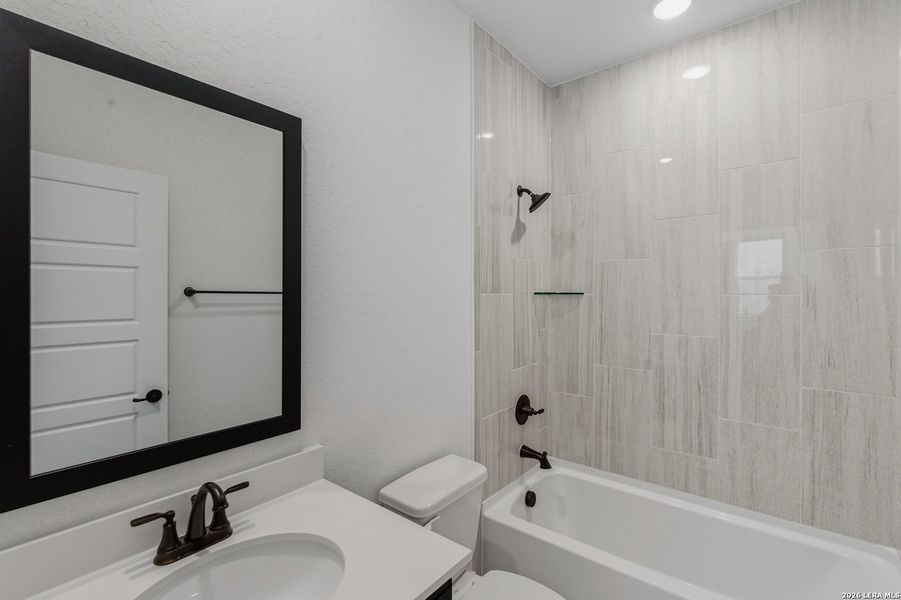 Furnished interior view inside a new home in Centero at Stone Oak, San Antonio (Image 7).