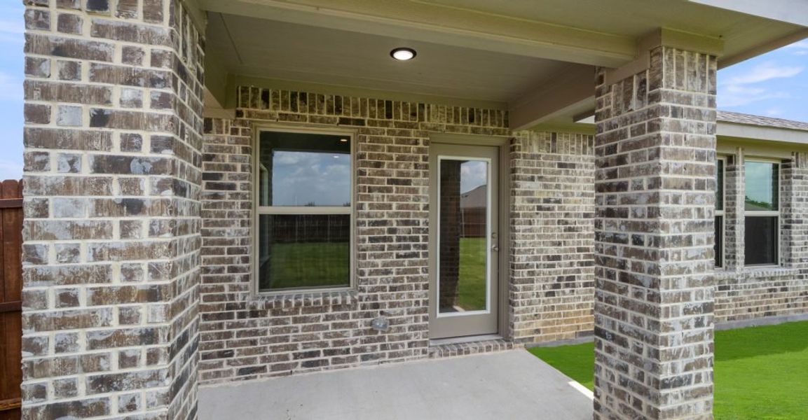 Representative exterior photo of a completed home built from the Atlanta by Impression Homes in Baker Farms, Cleburne, TX (Image 26). Representative exterior photo of a completed home built from the Atlanta by Impression Homes in Baker Farms, Cleburne, TX (Image 26).
