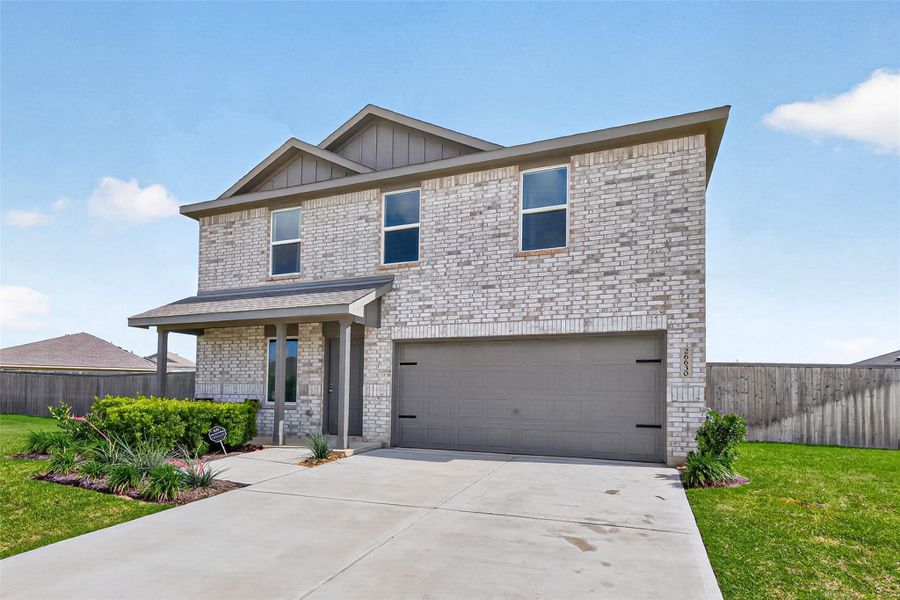 Front exterior of a new home in Anniston, Katy, TX, highlighting curb appeal (Image 21).