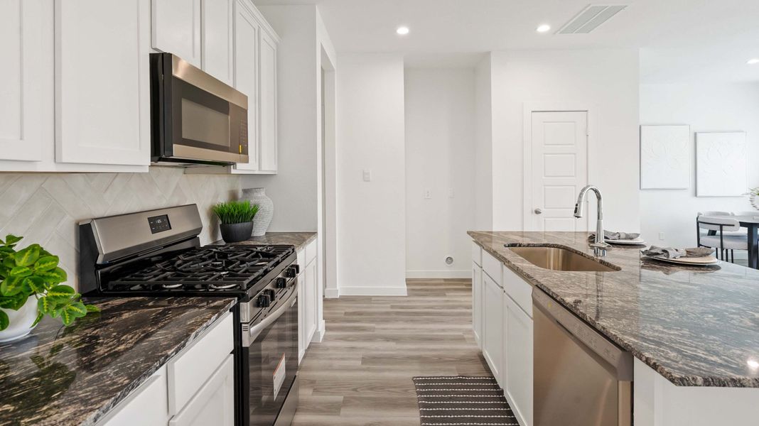 Representative furnished interior of a home built from the Hibiscus by D.R. Horton in Grand West, Houston (Image 6). Representative furnished interior of a home built from the Hibiscus by D.R. Horton in Grand West, Houston (Image 6).