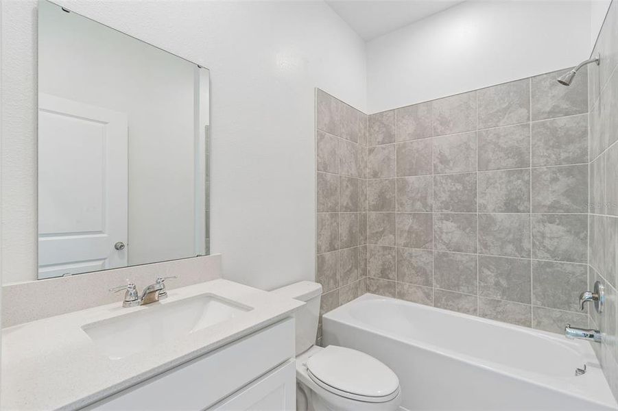 Furnished interior view inside a new home in Peace Creek Reserve, Winter Haven (Image 29).