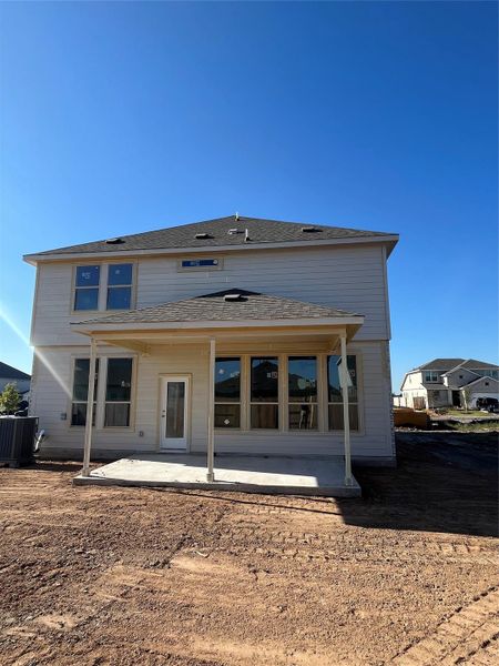 Rear view of property with a patio