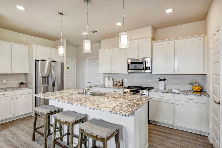 Photos shown are of a staged model home and are for illustration purposes only. Actual home features, finishes, and layout may vary. Photos shown are of a staged model home and are for illustration purposes only. Actual home features, finishes, and layout may vary.