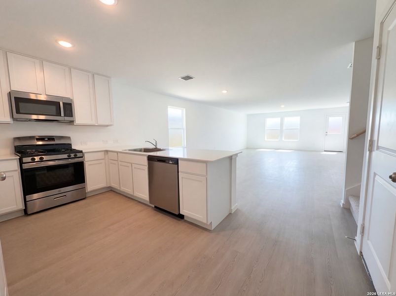 Furnished interior view inside a new home in Hunters Ranch, San Antonio (Image 8).
