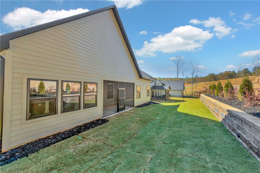 Exterior details and patio area of a home in Edwards Ridge, Central (Image 3).