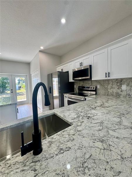 Furnished interior view inside a new home in , Lakeland (Image 14). Furnished interior view inside a new home in , Lakeland (Image 14).