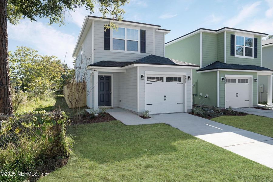Front exterior of a new home in , Jacksonville, FL, highlighting curb appeal (Image 2).