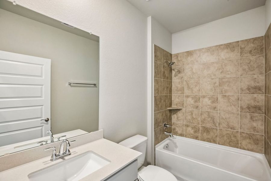 Furnished interior view inside a new home in Mustang Meadows, Waller (Image 11).
