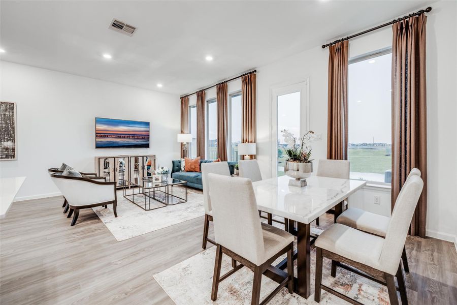 Furnished interior view inside a new home in Bridgeland, Cypress (Image 12).
