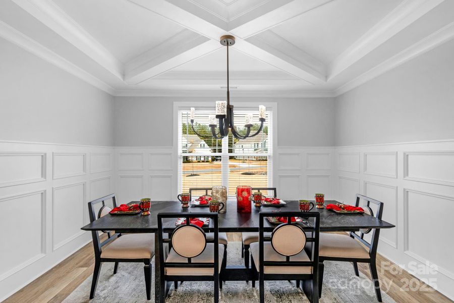 Formal dining room with coffered ceiling