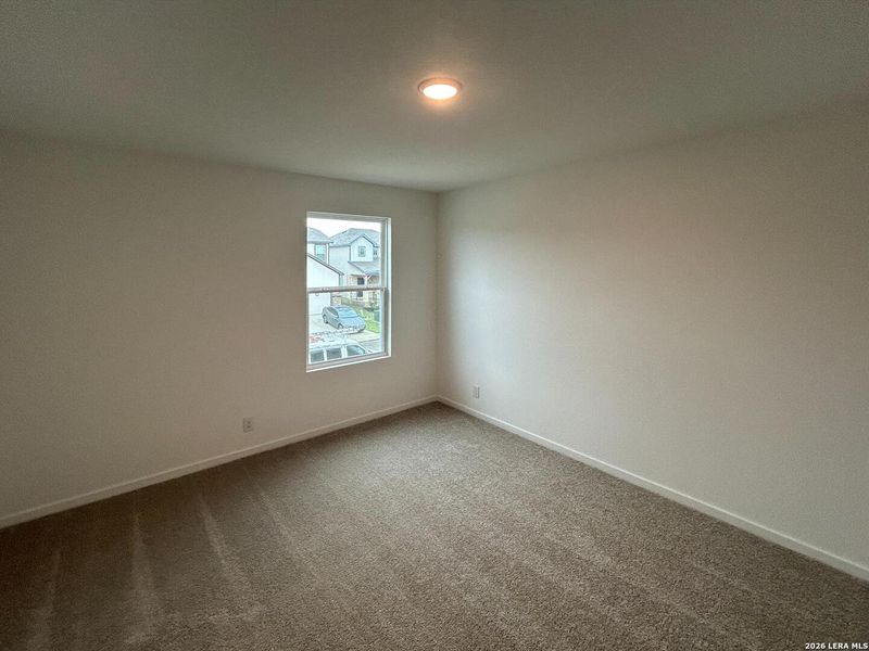 Spacious, unfurnished interior of a new home in Hennersby Hollow, San Antonio (Image 25).