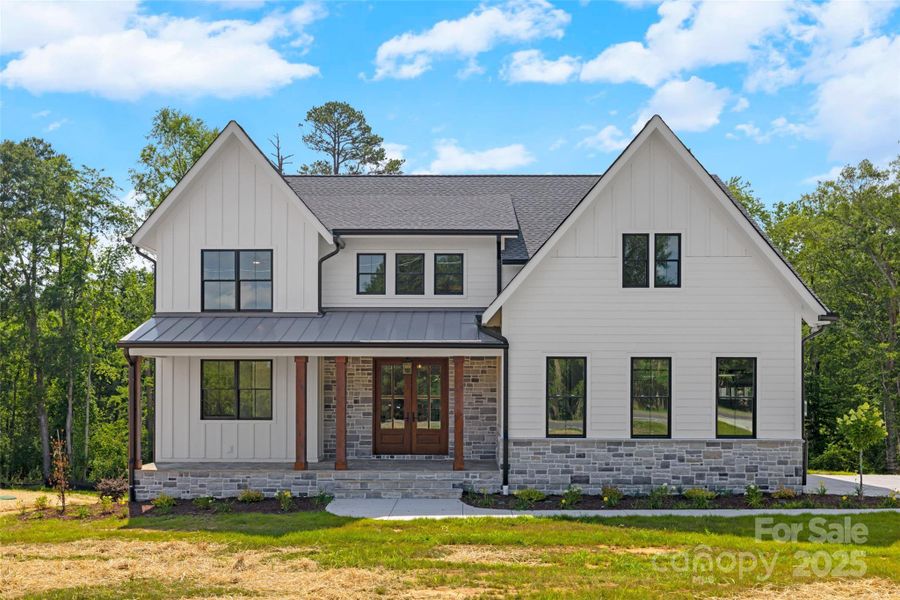 Front exterior of a new home in , Clover, SC, highlighting curb appeal (Image 2).