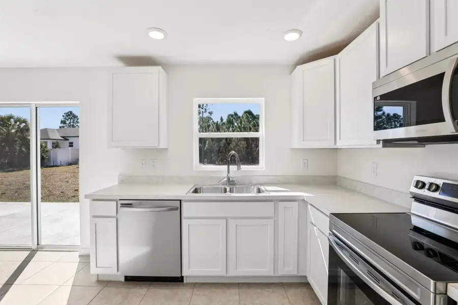 Representative furnished interior of a home built from the Poinsettia by Maronda Homes in Palm Bay, Palm Bay (Image 3).
