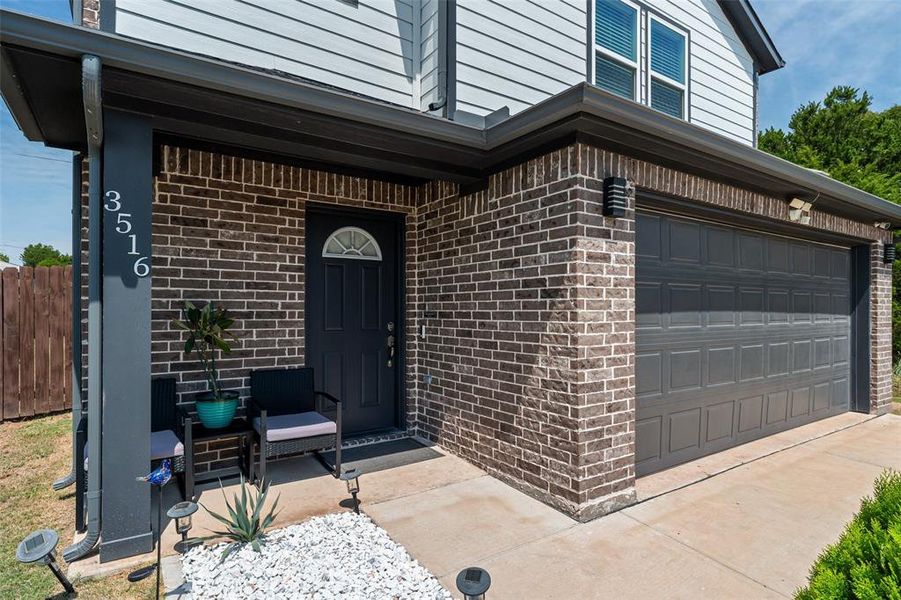 Front exterior of a new home in , Granbury, TX, highlighting curb appeal (Image 18).