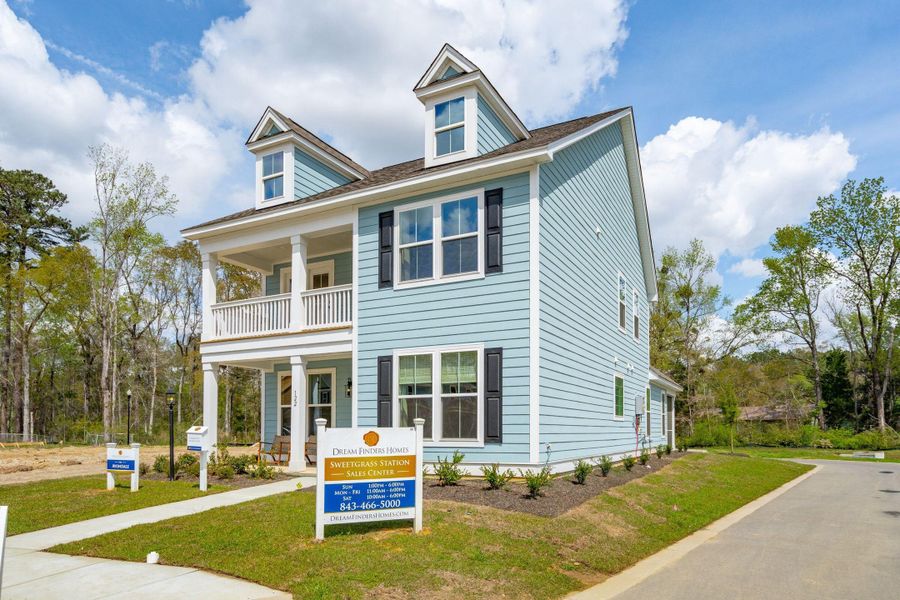 Front exterior of a new home in Sweetgrass Station, Summerville, SC, highlighting curb appeal (Image 2). Front exterior of a new home in Sweetgrass Station, Summerville, SC, highlighting curb appeal (Image 2).