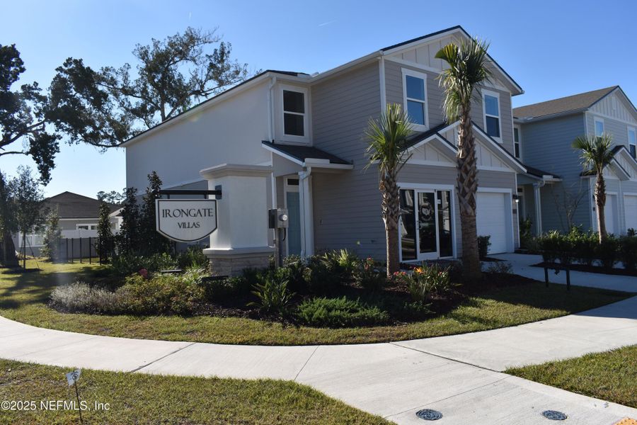 Front exterior of a new home in Irongate Villas, Jacksonville, FL, highlighting curb appeal (Image 28).