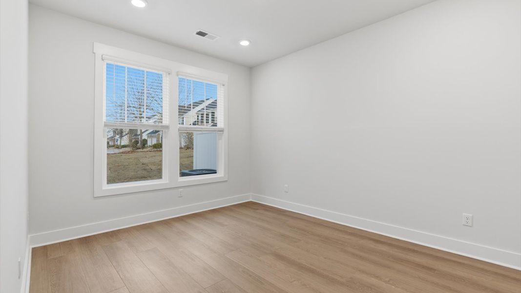 Spacious and serene primary suite with thoughtful design in a desirable DRB Homes community