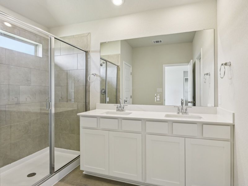 Primary suite bathroom in the Oleander floorplan at a Meritage Homes community.