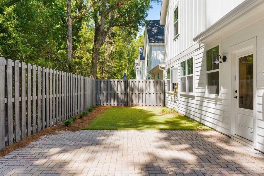 Exterior details and patio area of a home in , Johns Island (Image 3).