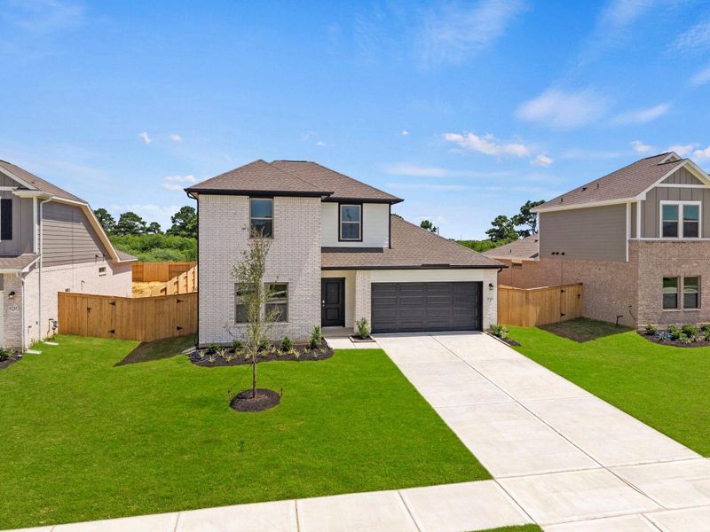 Front exterior of a new home in Windcress, Cove, TX, highlighting curb appeal (Image 2). Front exterior of a new home in Windcress, Cove, TX, highlighting curb appeal (Image 2).